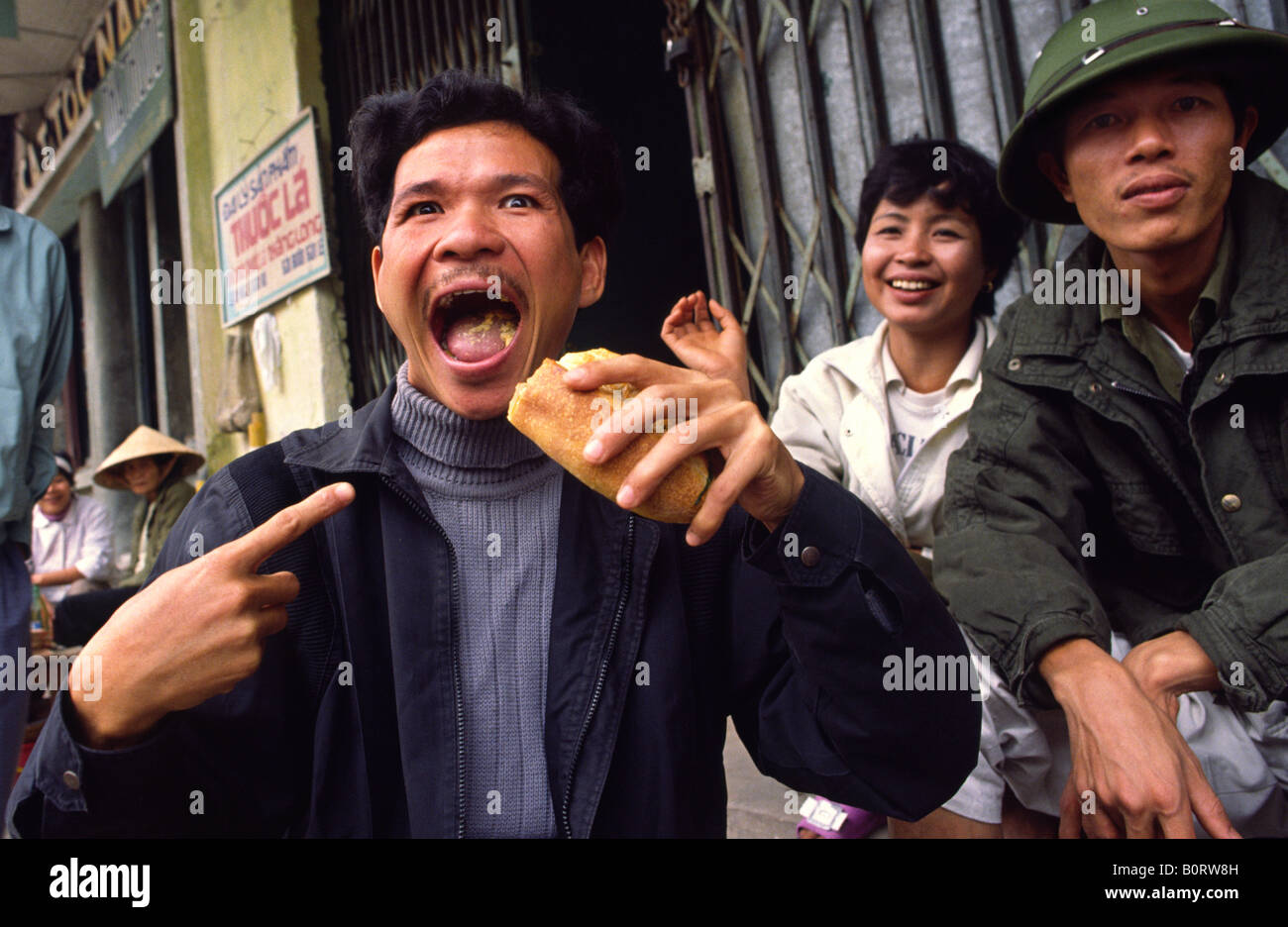 Old man pointing mouth hi-res stock photography and images - Alamy