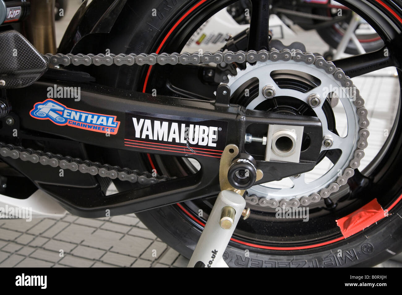 Rear wheel assembly on a Yamaha R1 motorcycle. Brands Hatch, Kent, England. Stock Photo