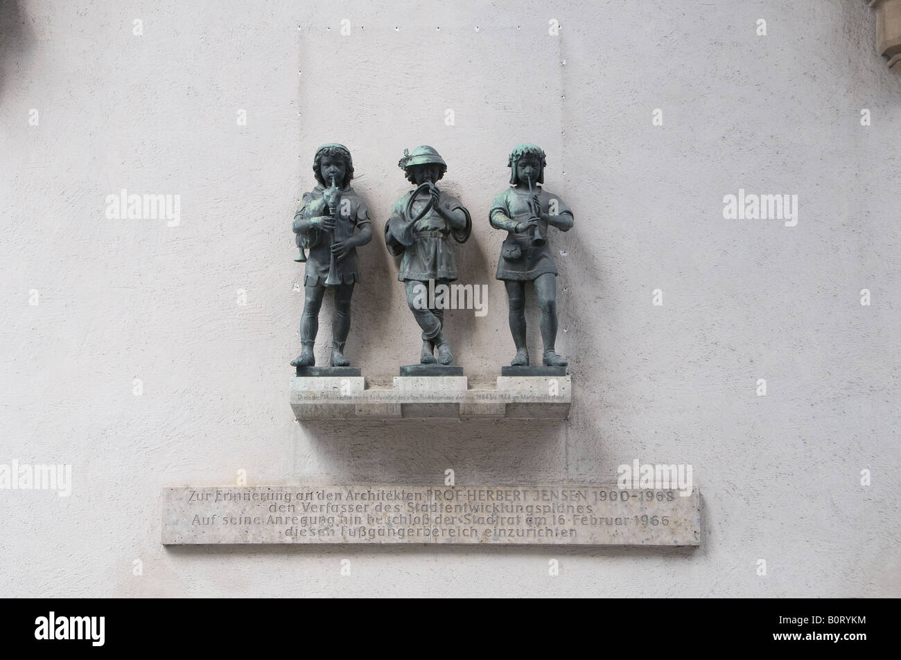 The three musicians sculpture by Konrad Knoll in Karlstor, gate inbound towards Neuhauser street pedestrian zone in Munich Bavaria Germany Stock Photo