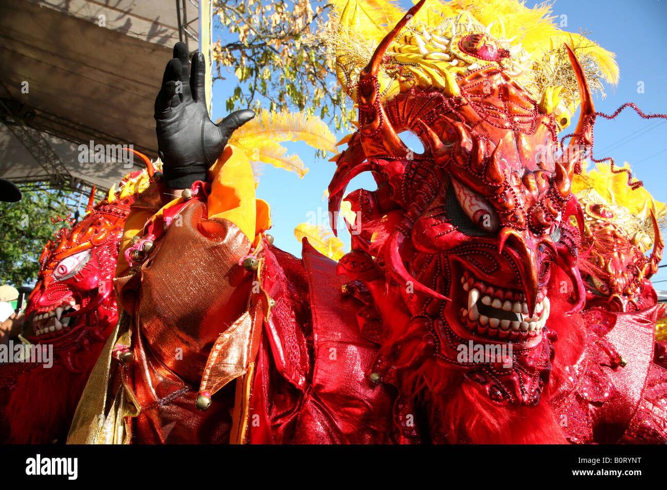 Carnival participants wearing fancy dress of Diablo Cojuelo perform