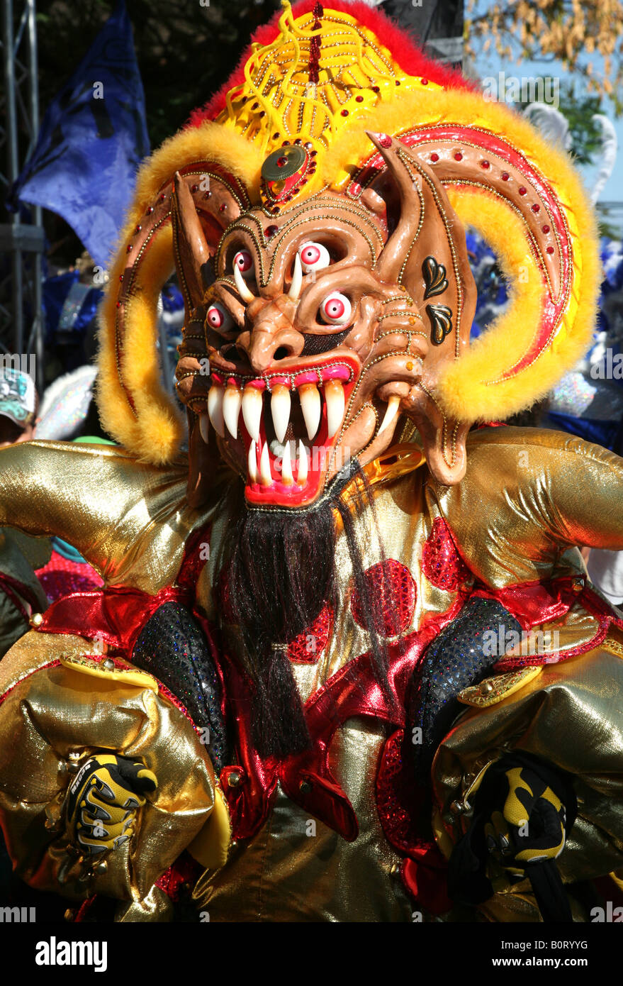 Carnival participant wearing fancy dress of Diablo Cojuelo performs