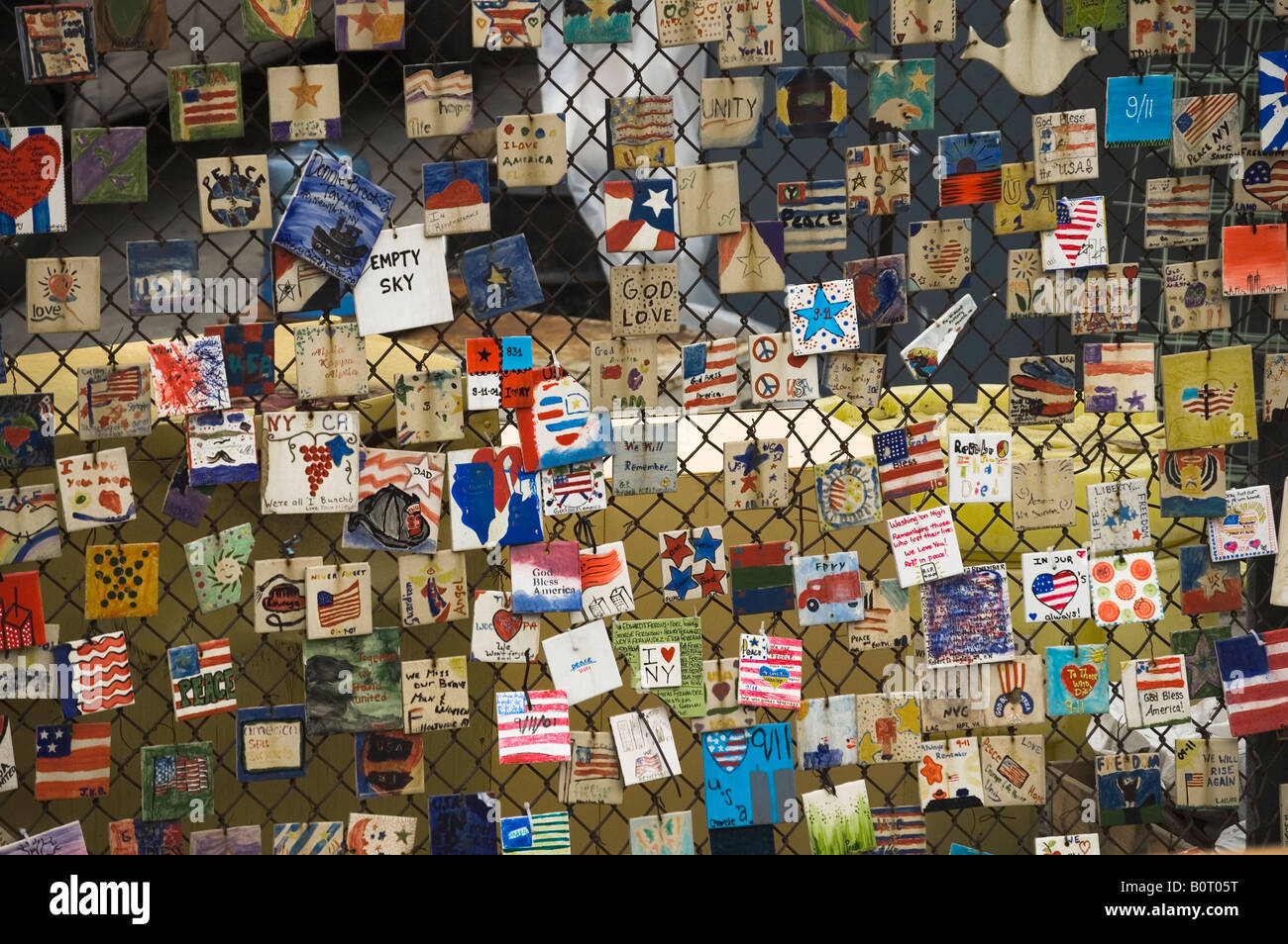 Tiles placed on a fence near ground zero new york that act as a memorial to the site. Stock Photo