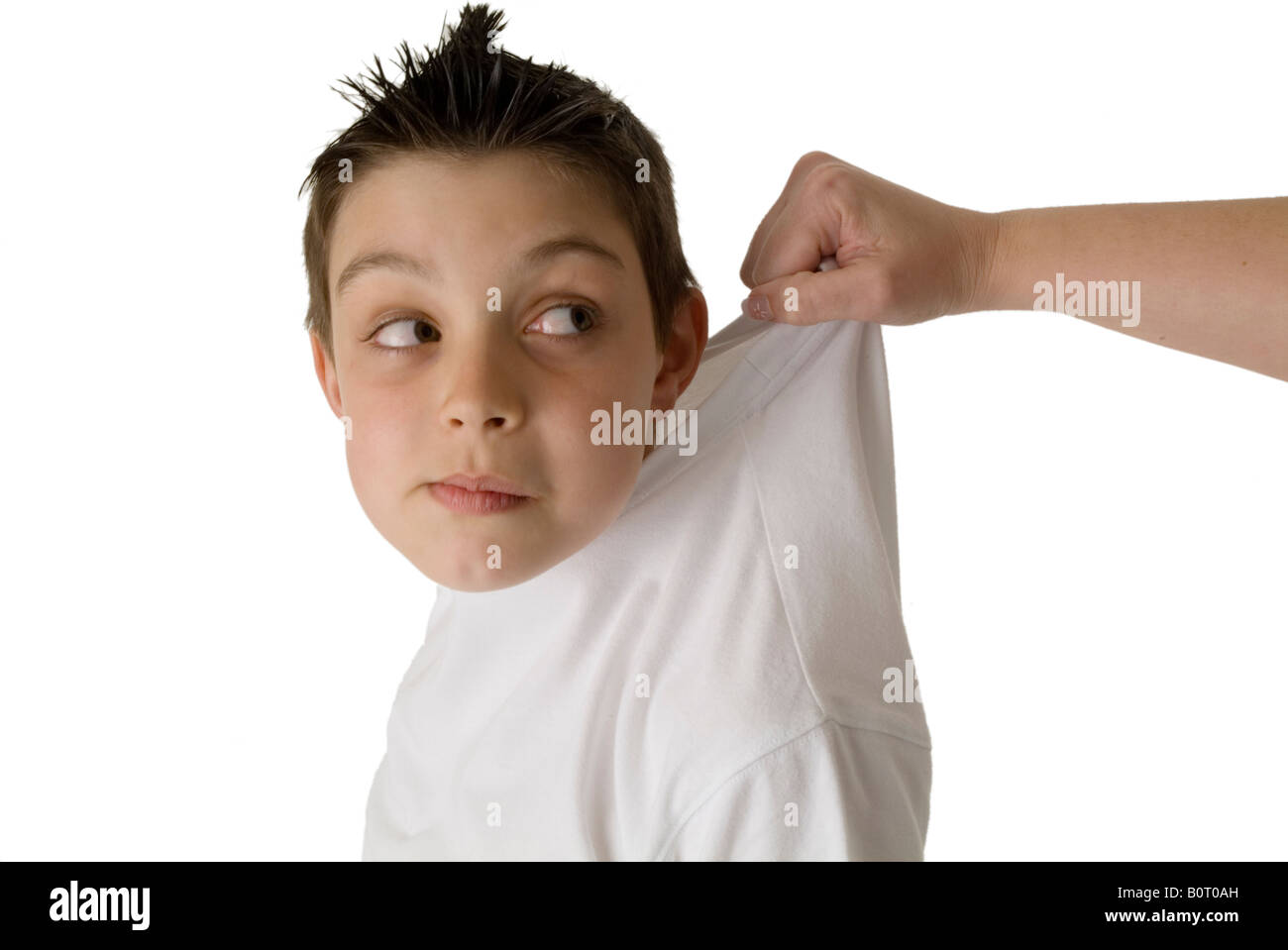 naughty boy child cheeky grabbed by the collar felt caught in the act