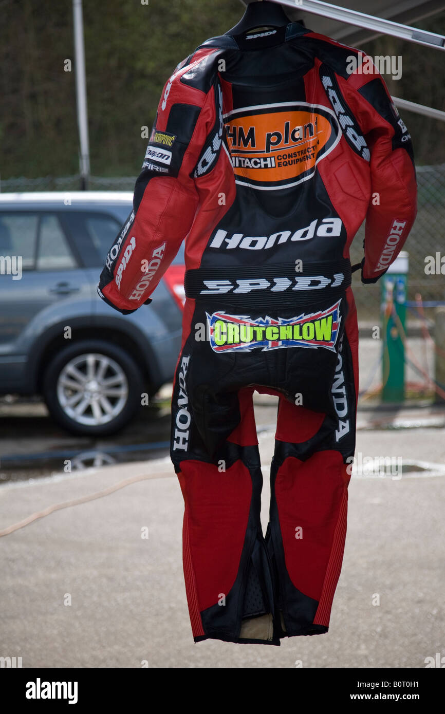 Cal Crutchlow's riding leathers airing in the sunshine. Brands Hatch Racing Circuit, Kent, England. Stock Photo