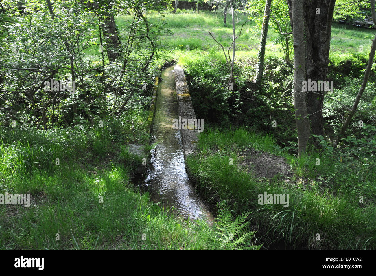 A béal, a man-made water irrigation channel, near Génolhac, Gard, France. Stock Photo