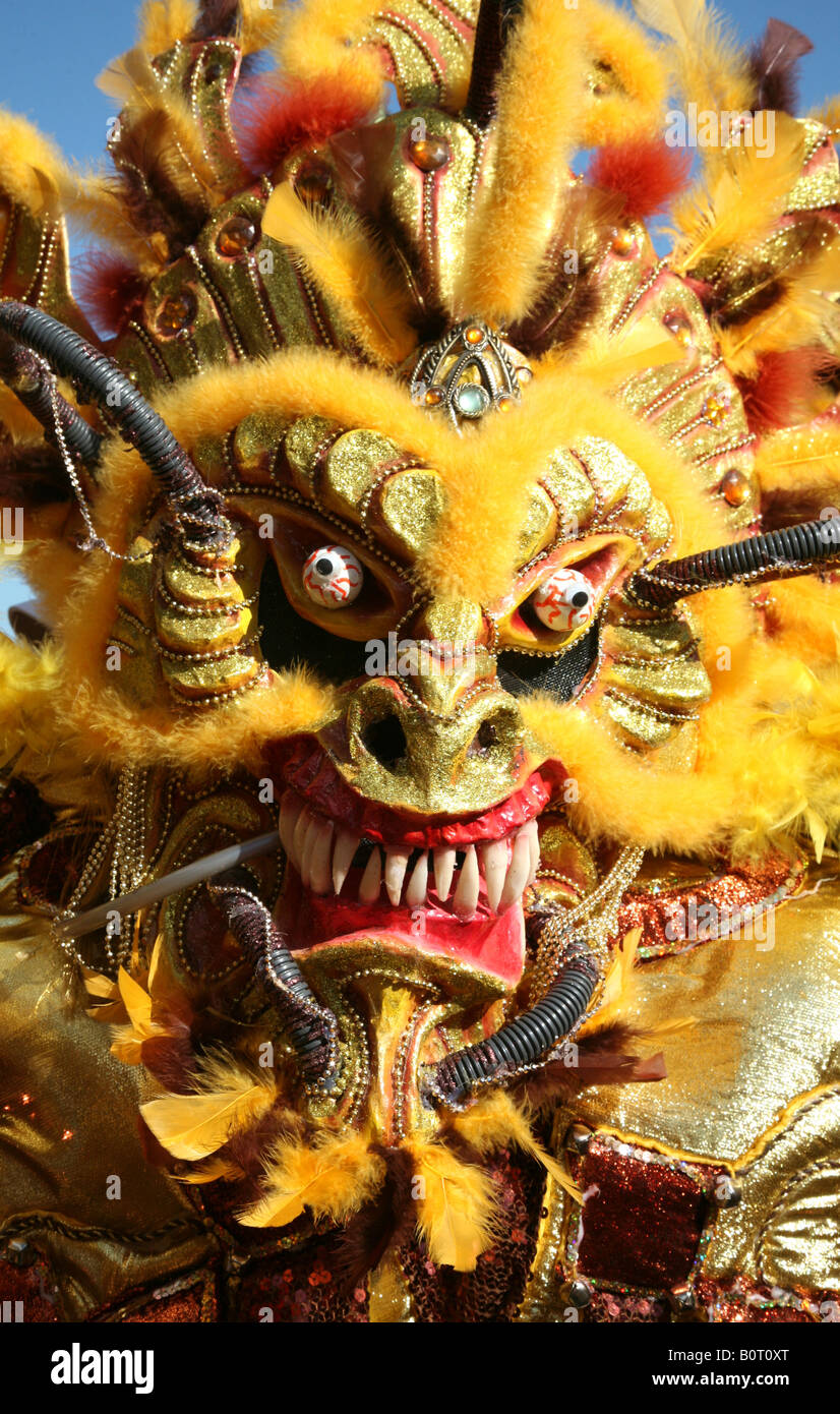 Carnival participant wearing fancy dress of Diablo Cojuelo performs