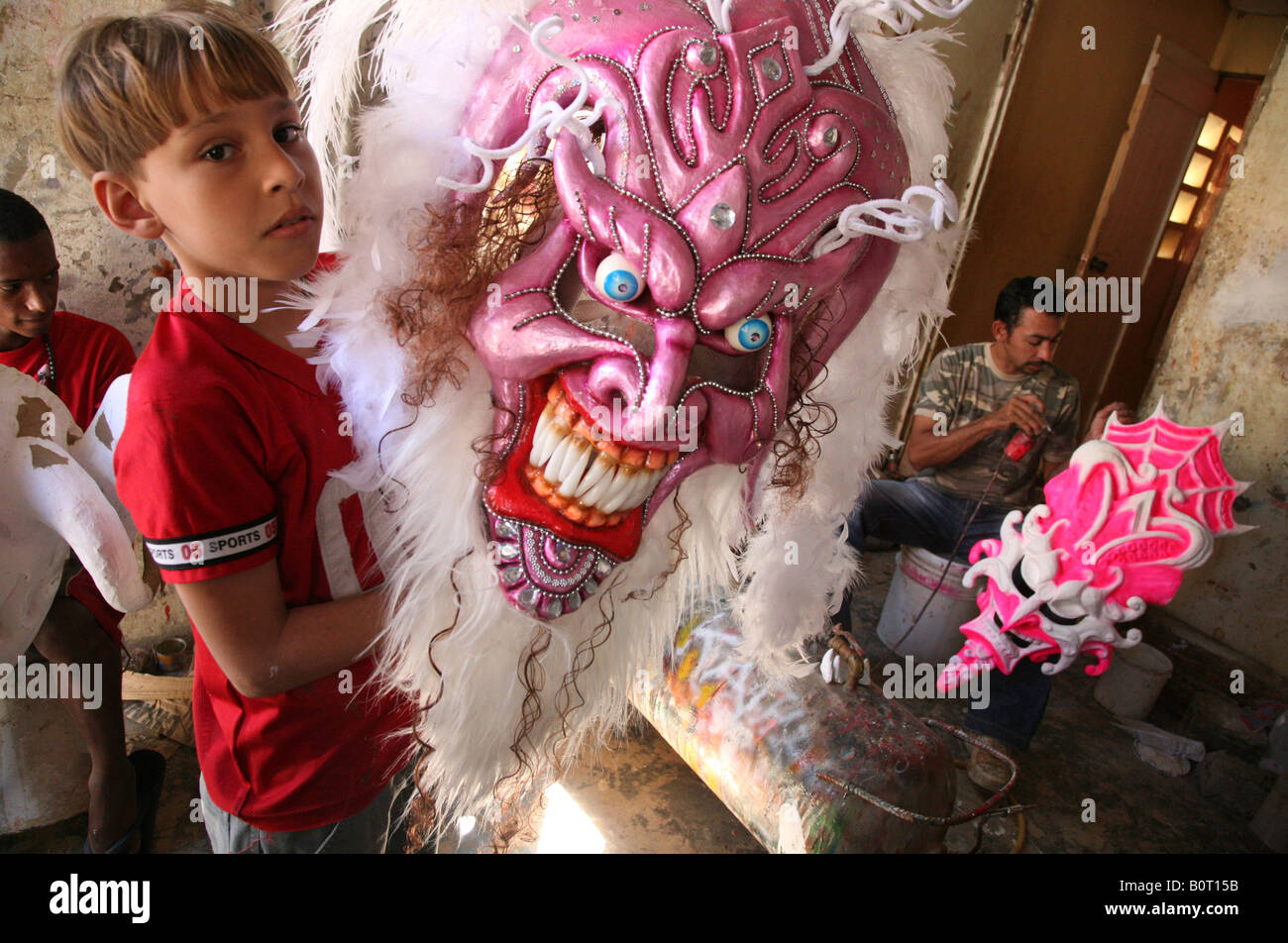 Dominican maskmaker in his workshop prepares carnival masks Diablo