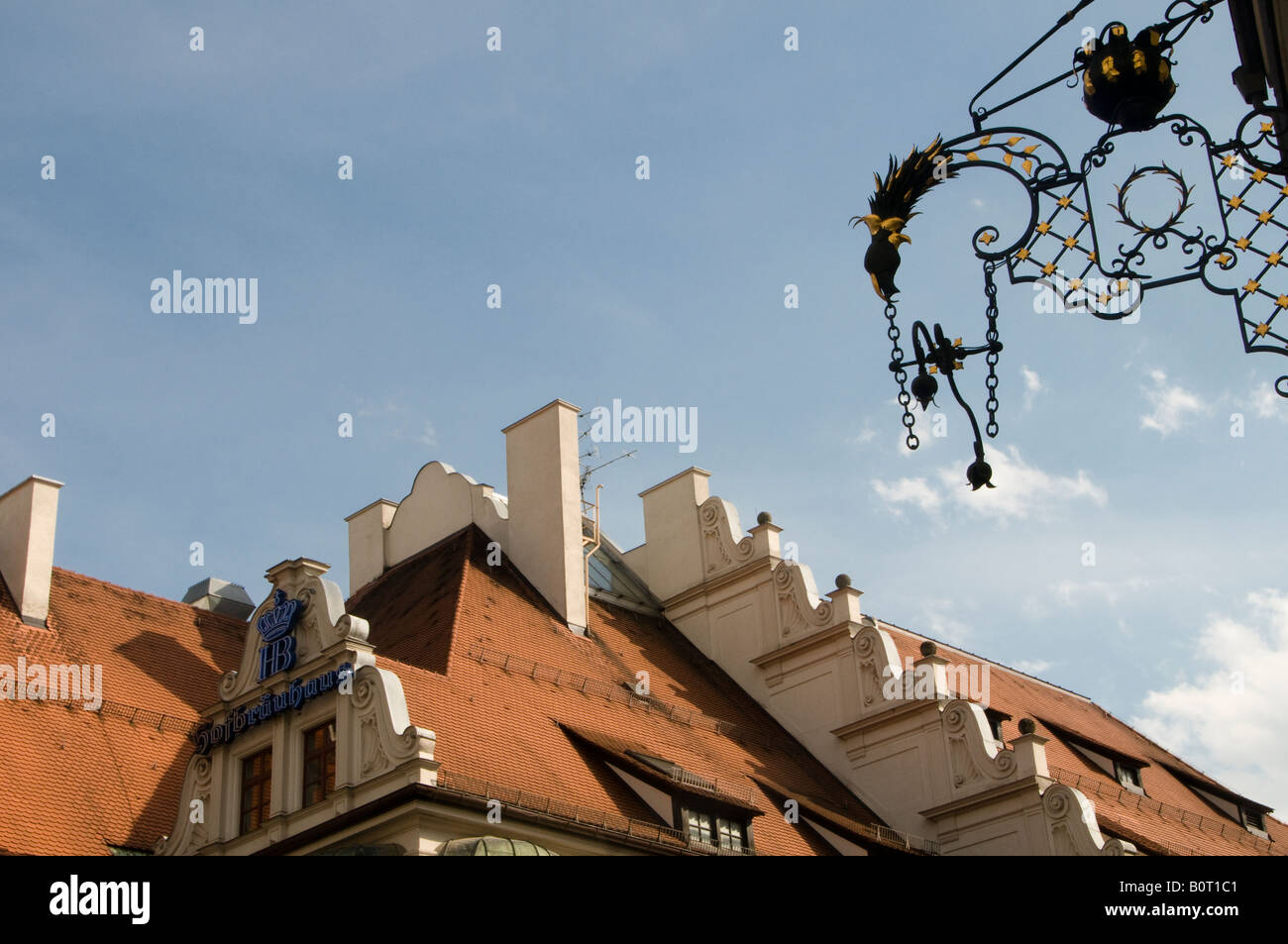 Medieval wrought iron shop sign in the city of Munich capital of Bavaria Germany Stock Photo