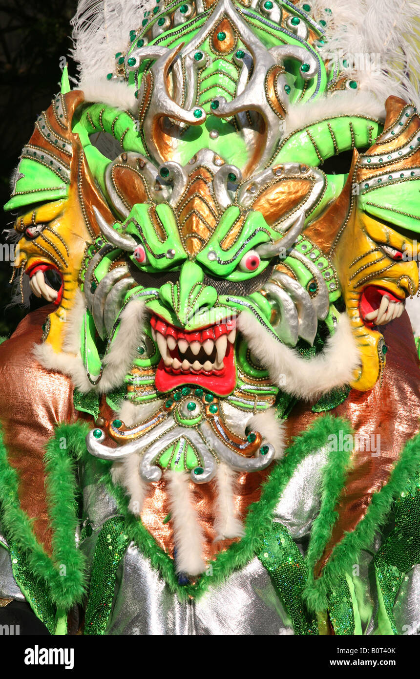 Carnival participant wearing fancy dress of Diablo Cojuelo performs