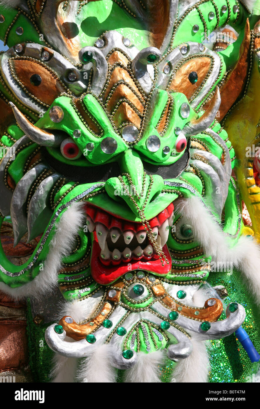 Carnival participant wearing fancy dress of Diablo Cojuelo performs