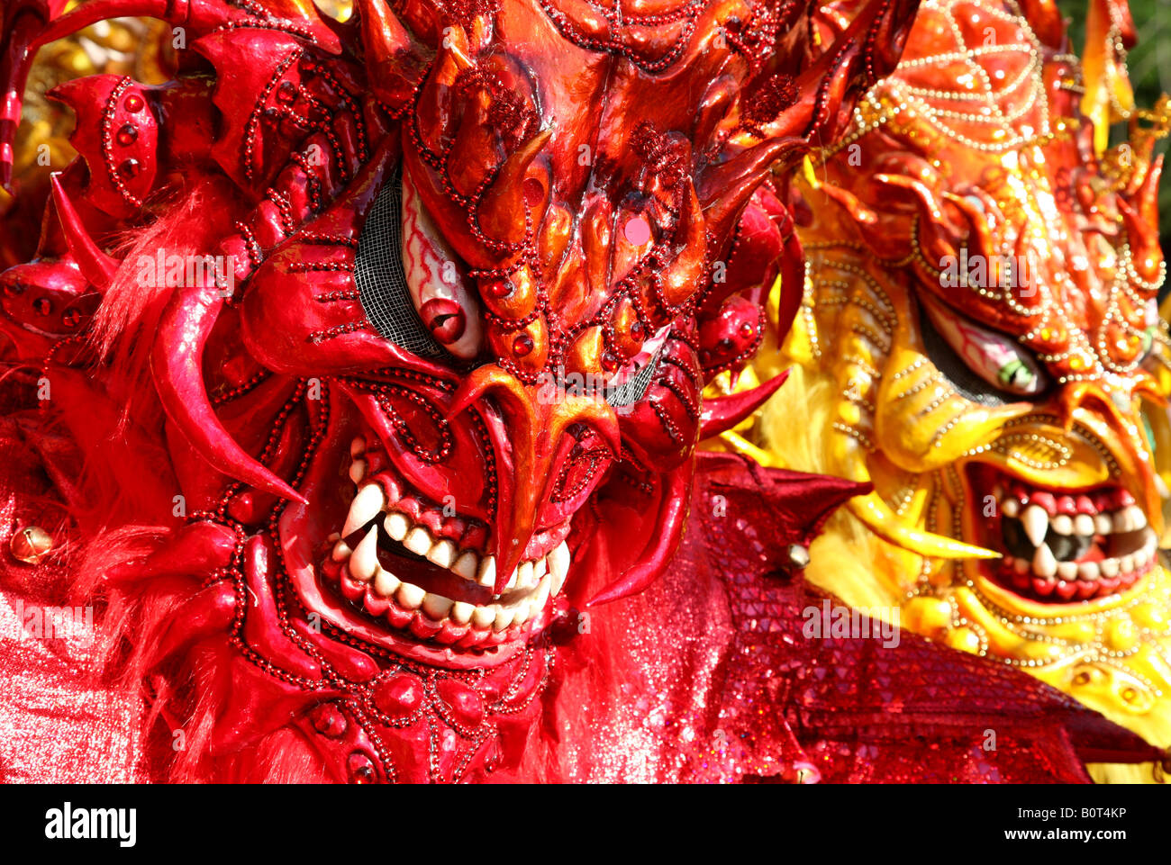 Carnival participants wearing fancy dress of Diablo Cojuelo perform