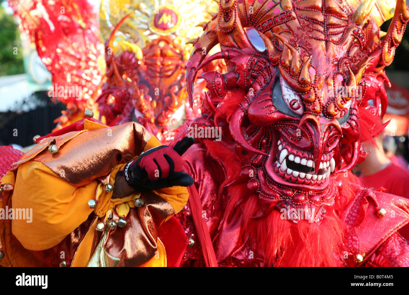 Carnival participants wearing fancy dress of Diablo Cojuelo perform