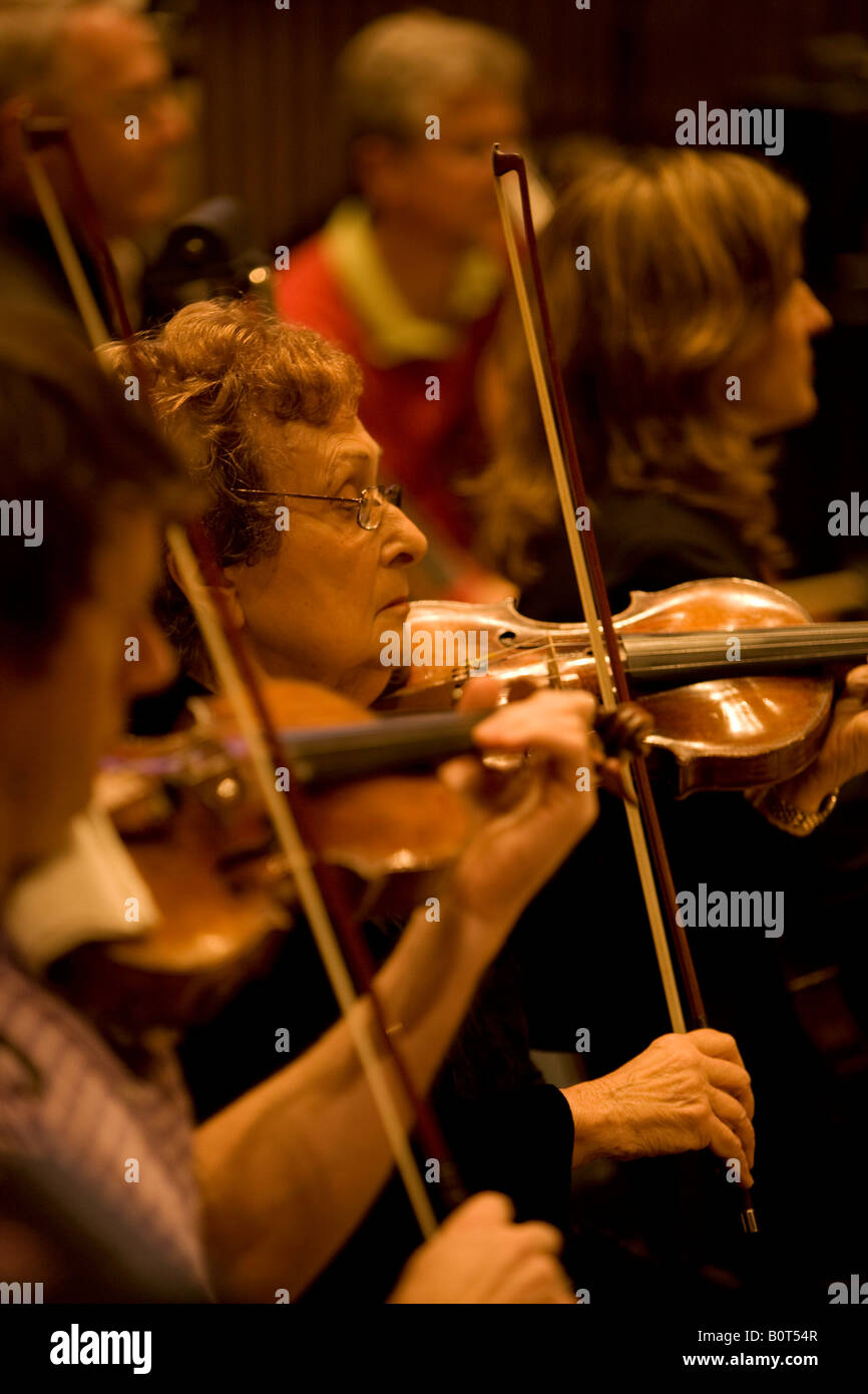 Violin section of the New York Pops Orchestra Stock Photo Alamy