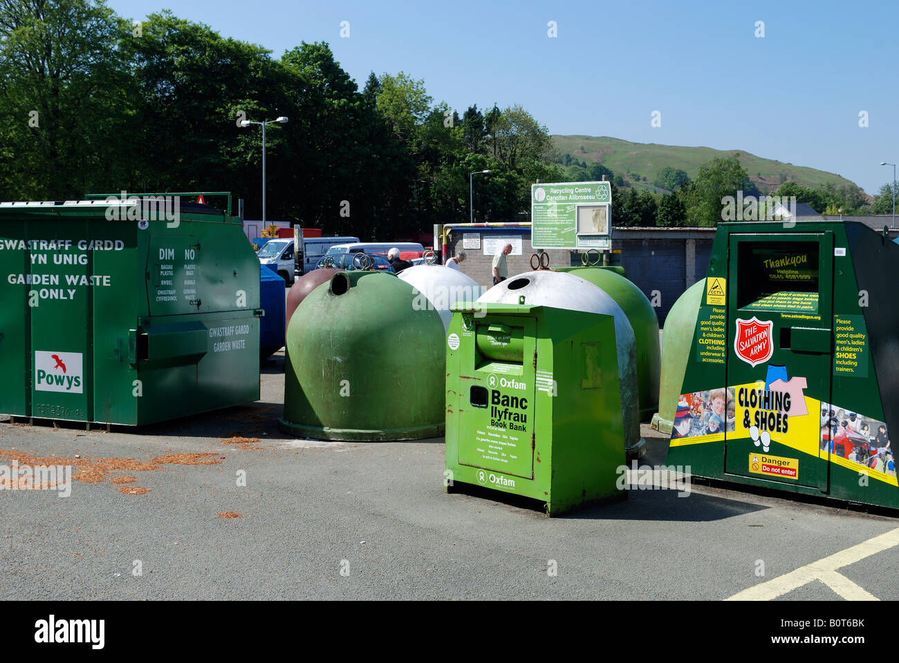 A VARIETY OF WELSH AND ENGLISH WORDED RECYCLING BINS IN MACHYNLLETH