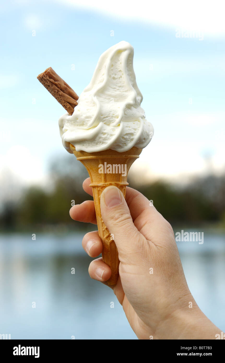Mr Whippy style ice cream. Close up, held in hand Stock Photo Alamy