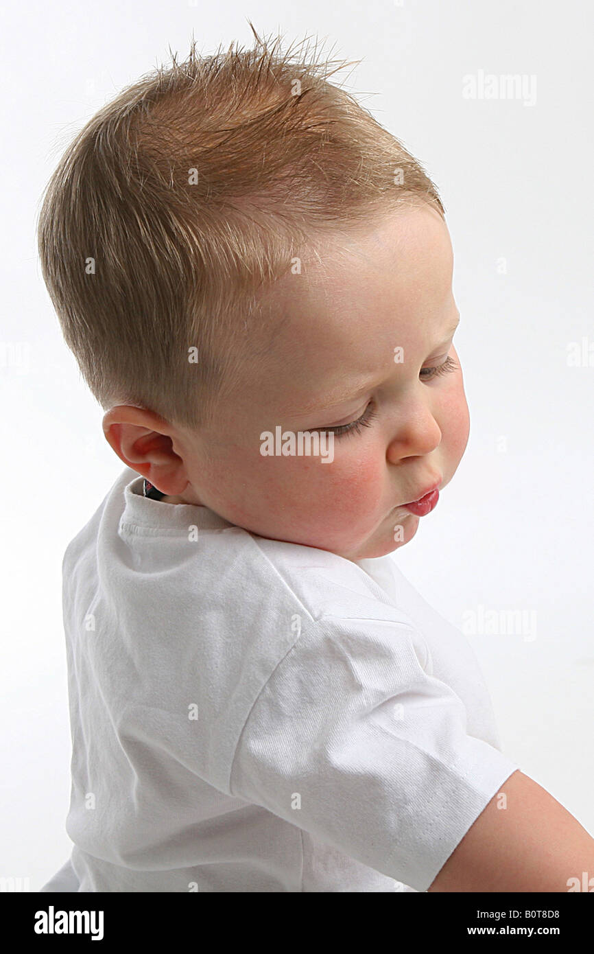 Close up of baby boy with blue eyes Stock Photo