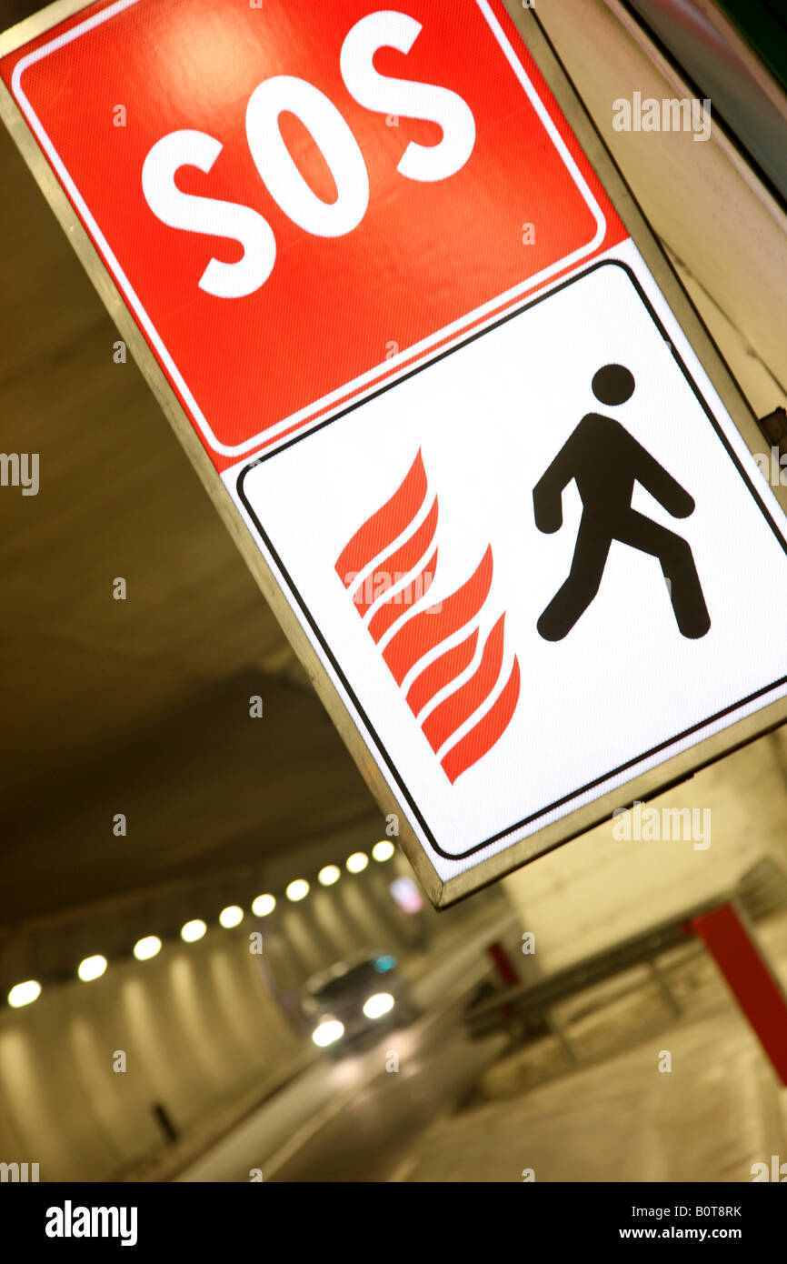 Emergency exit sign in a tunnel of a motorway Stock Photo Alamy