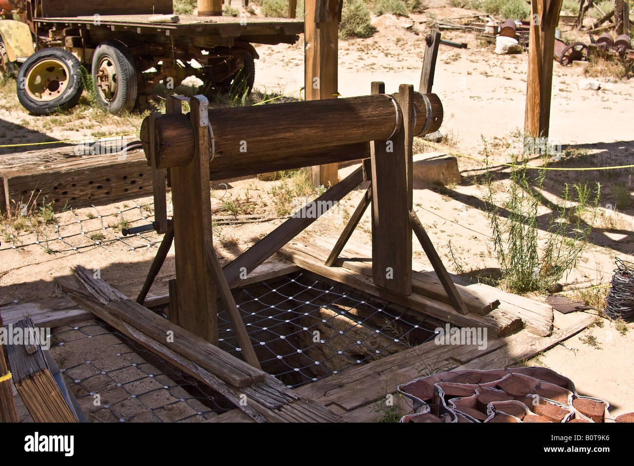 Wooden windlass used to draw drinking water from the well Stock Photo