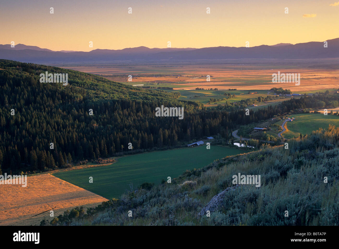 Sunset over the Driggs Victor Valley Idaho from the west slope of the Teton Range Targhee NF WYOMING Stock Photo