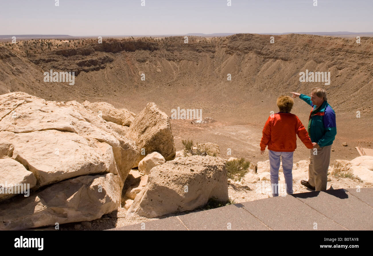 Caucasian Couple (50-60) Views Meteor Crater Arizona USA Stock Photo