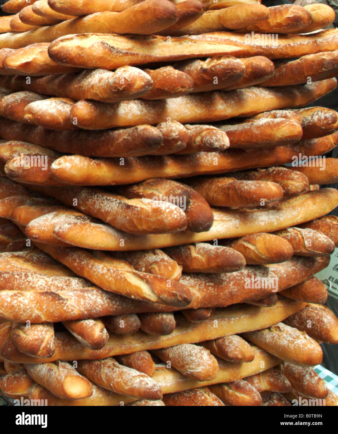 fresh-pile-of-bread-sticks-baguettes-B0T