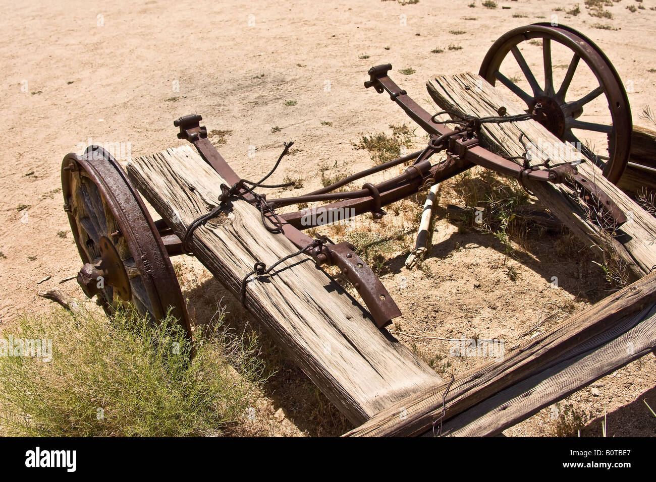 Old cart made from wood and ore cart wheels. Stock Photo