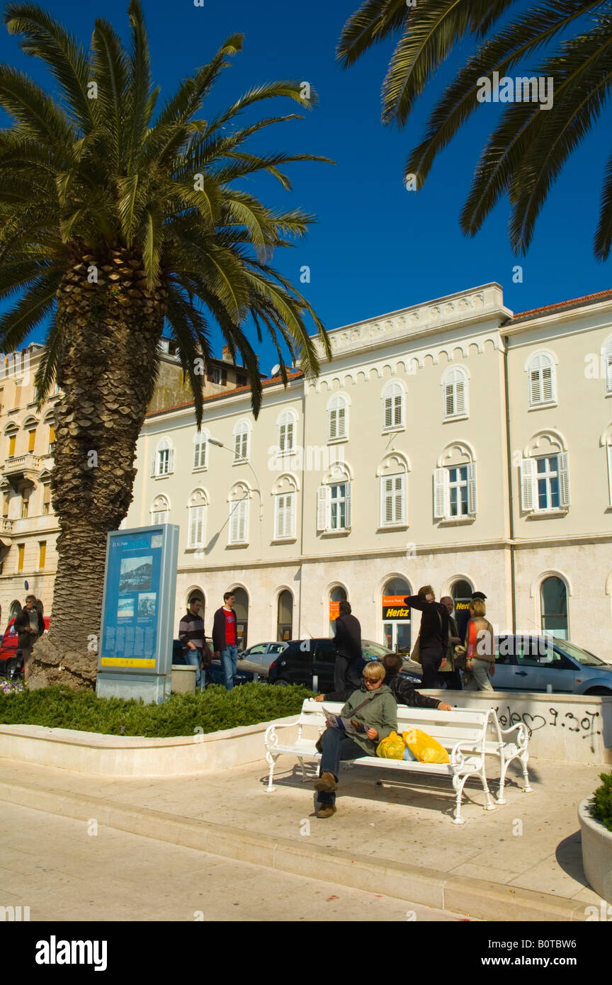 Woman reading on seaside boulevard in Split Croatia Europe Stock Photo