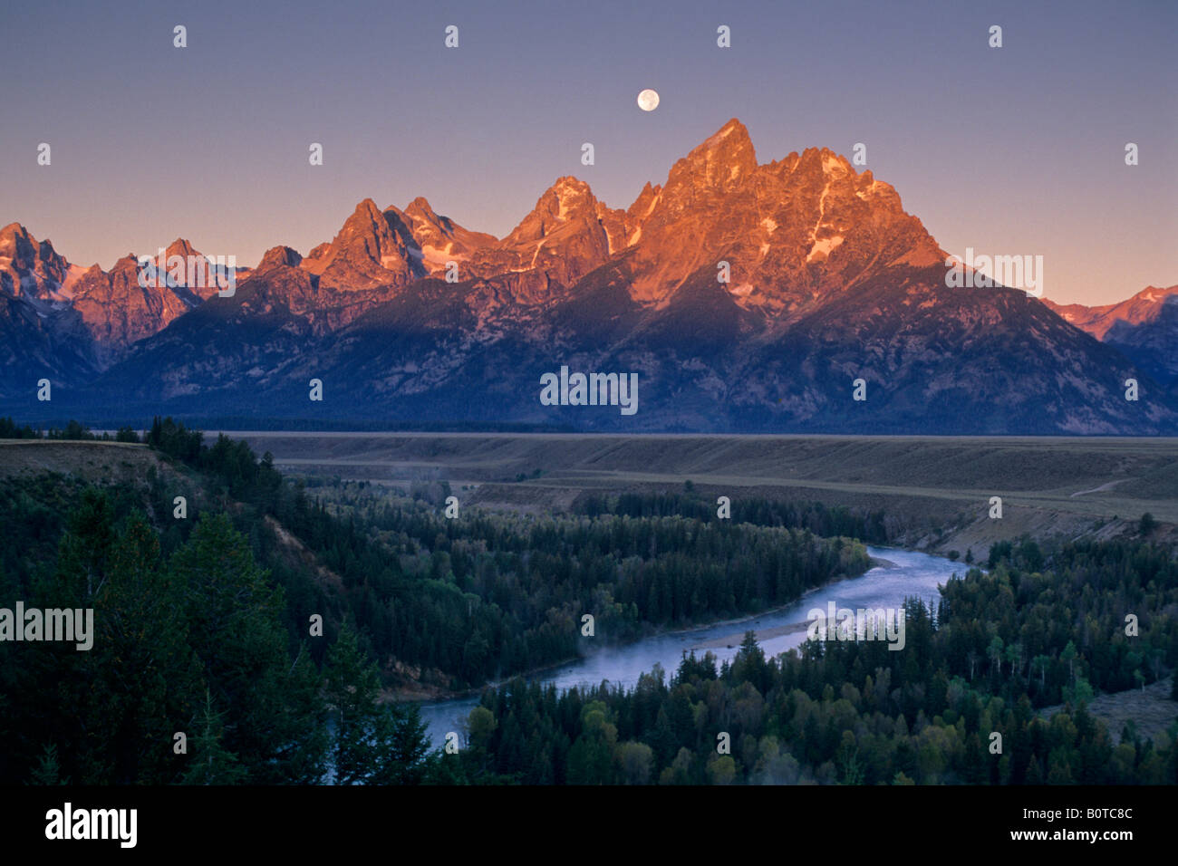 Moonset at dawn over the Teton Range and Snake River Grand Teton Nat l
