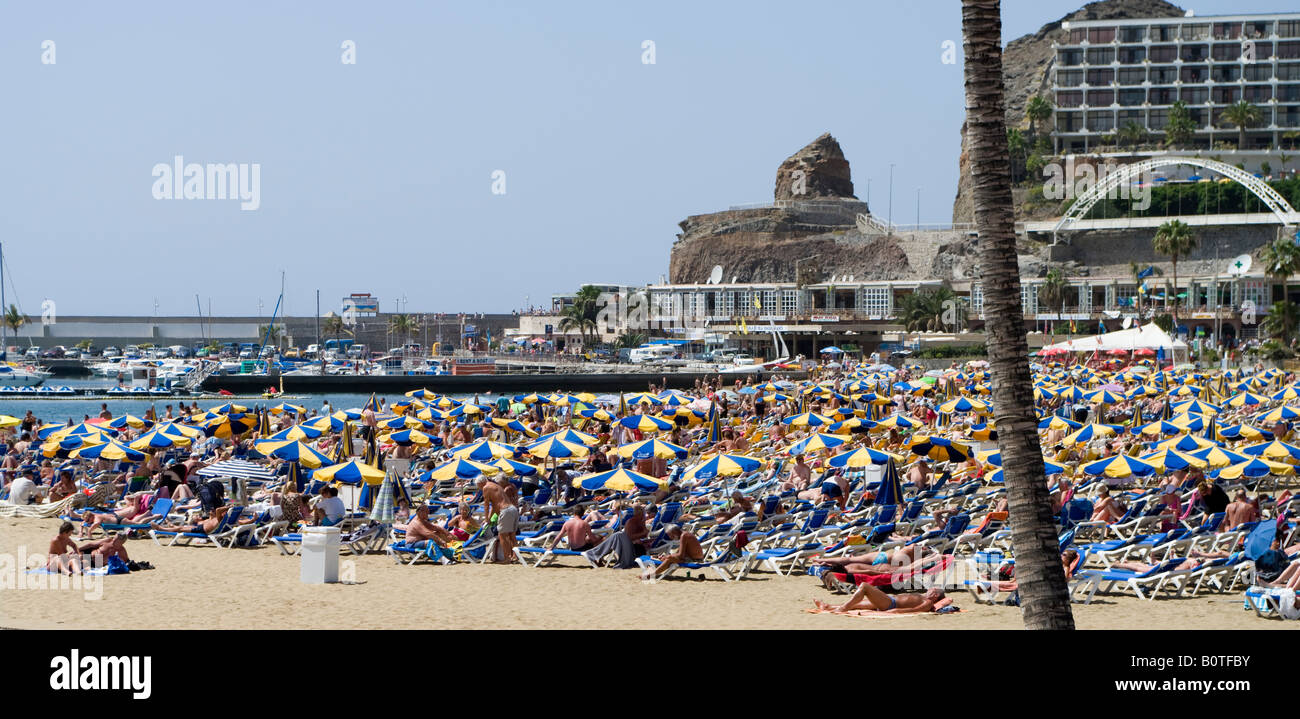 Gran Canaria - Puerto Rico resort Mogan district south coast holidaymakers in March week before Easter Stock Photo
