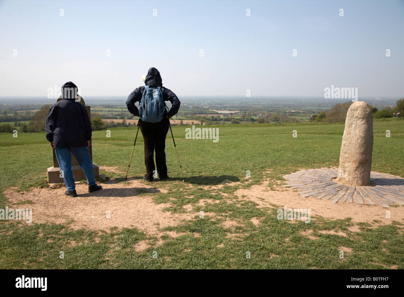 tourists stand near the lia fail stone of destiny on the forradh royal seat area of the hill of tara teamhair na ri hill of the Stock Photo