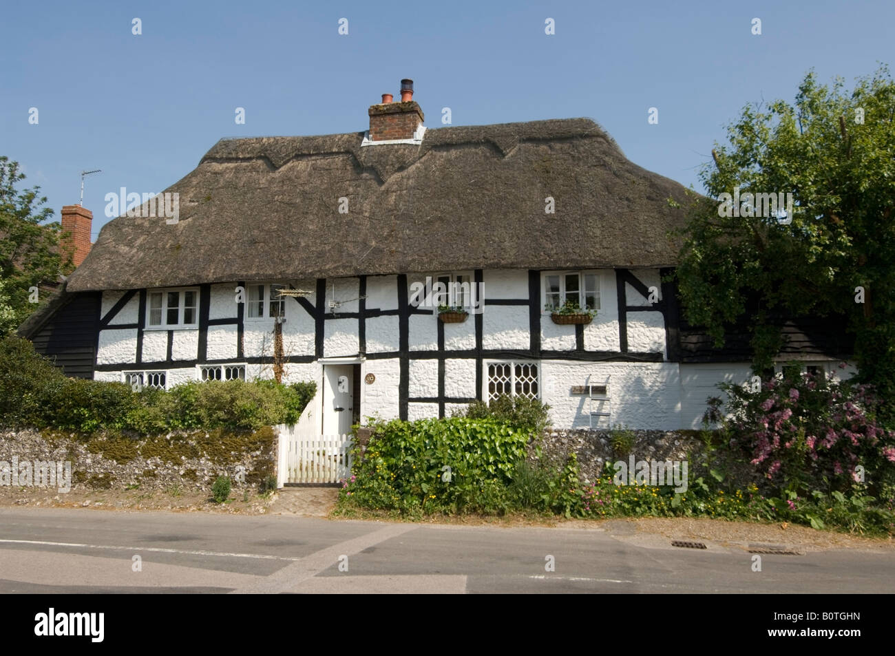 Old Whitewashed Cottage Hampshire UK Stock Photo