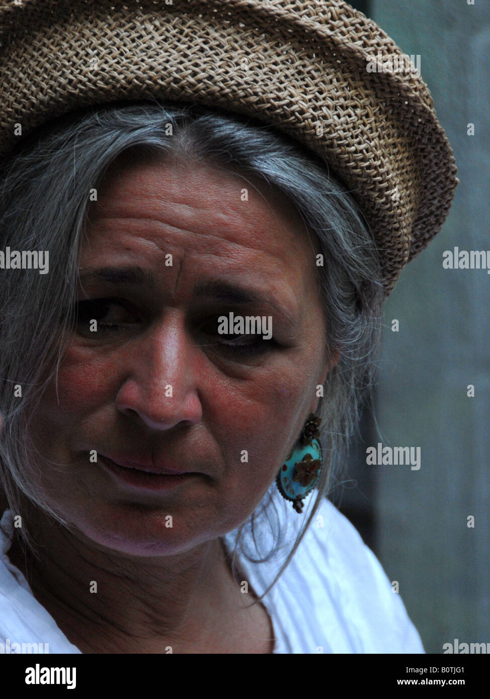 Older woman sitting side profile hi-res stock photography and images ...