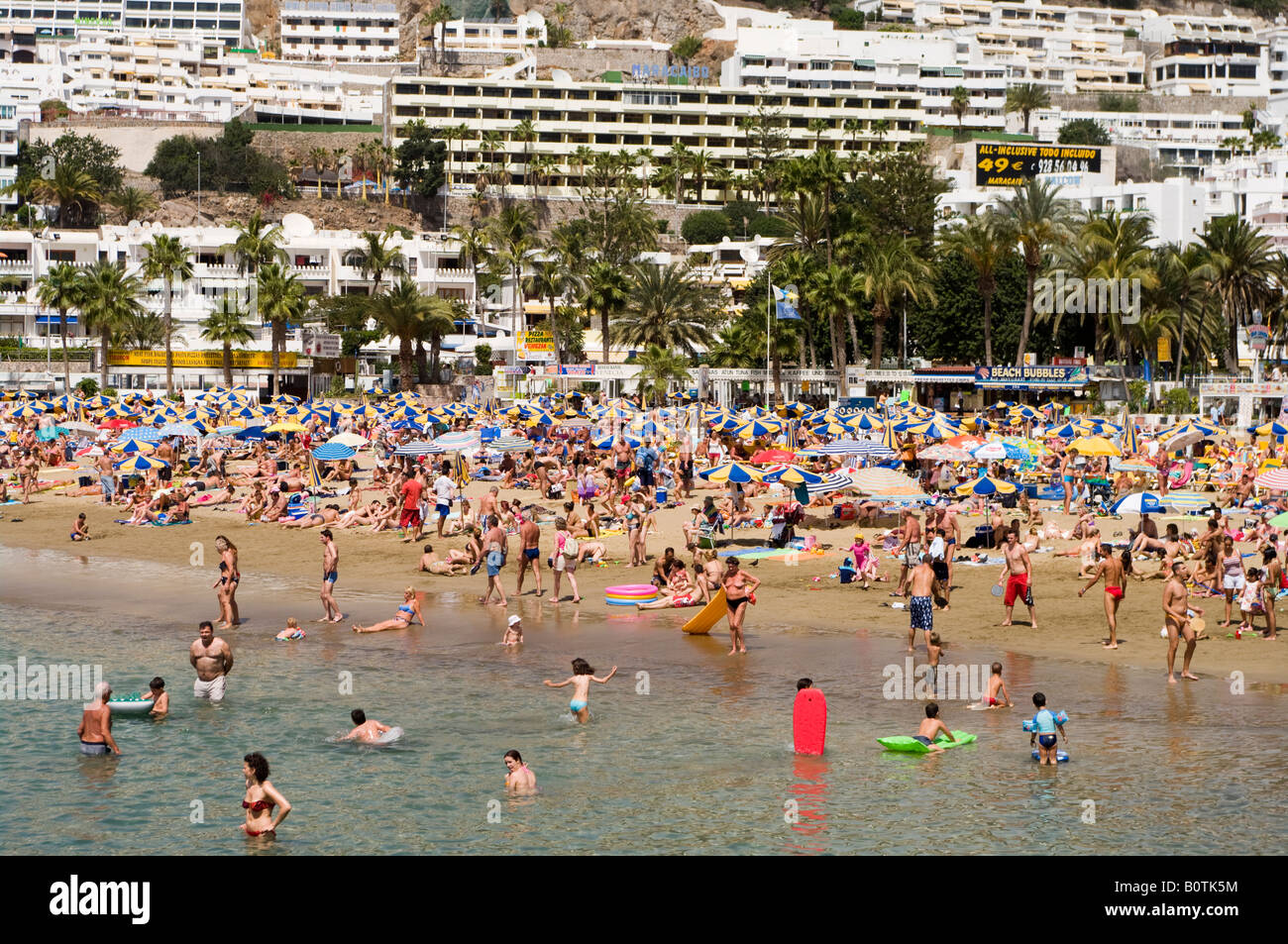 Gran Canaria - Puerto Rico resort Mogan district south coast holidaymakers in March week before Easter Stock Photo