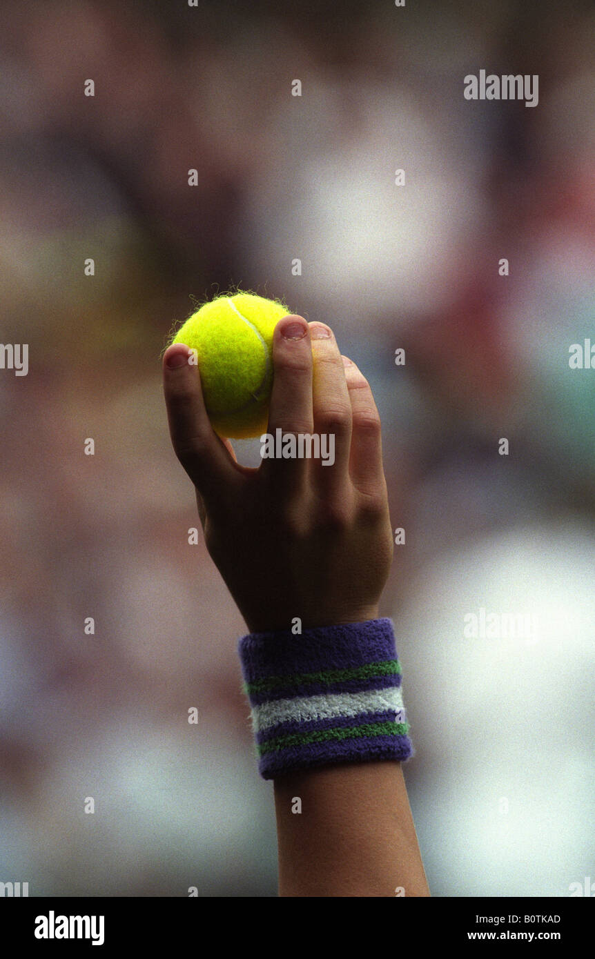 Wimbledon tennis championships ball boy holds up tennis ball Stock