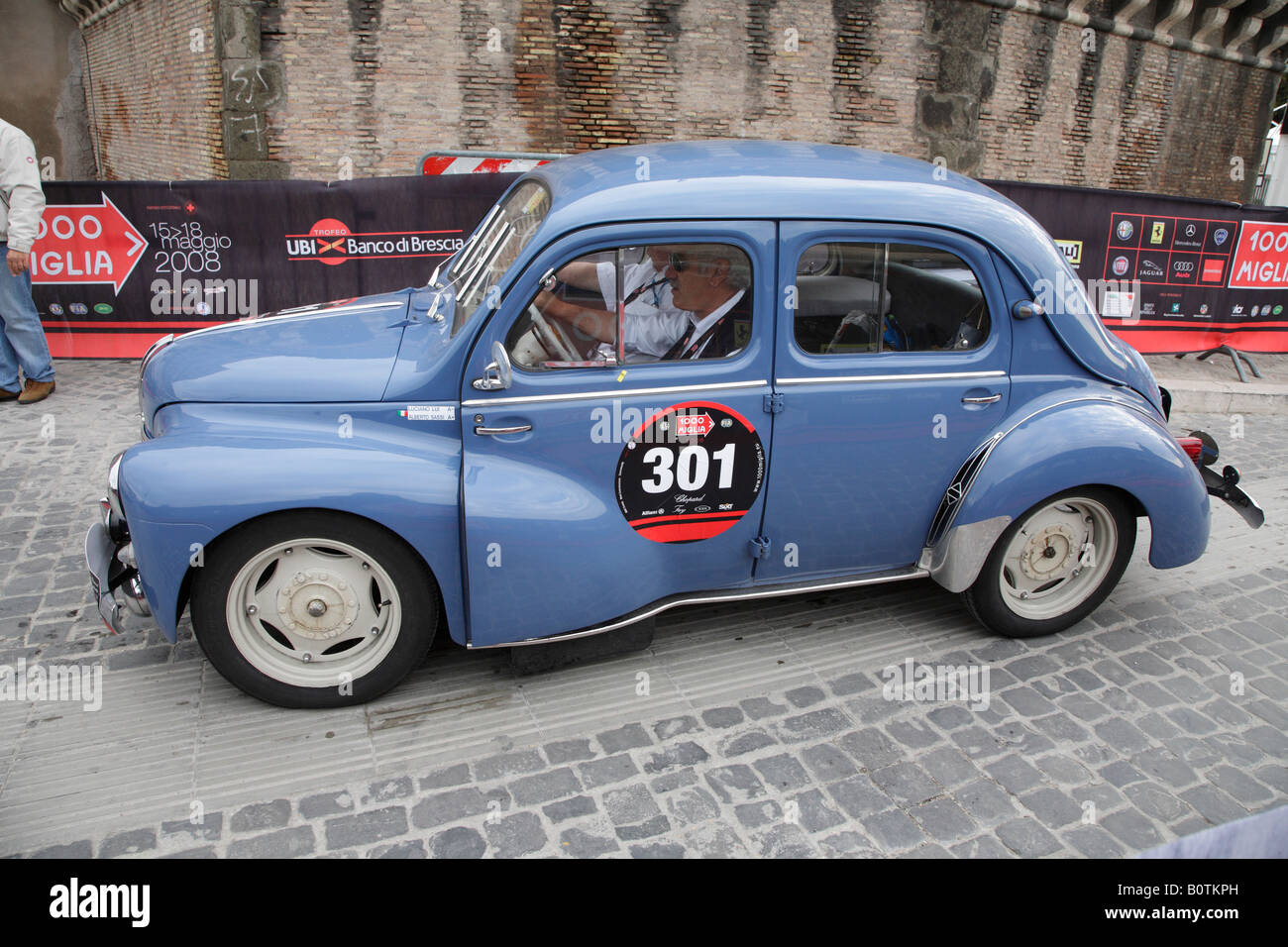 1957 RENAULT 4CV at castel Sant Angelo leaving Rome on third and last leg of mille miglia classic car rally 2008 Stock Photo