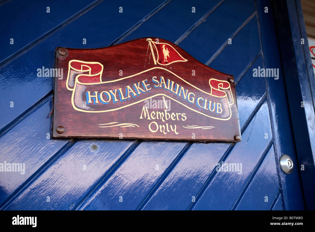 This image shows detail of the clubhouse sign on the front entrance to Hoyalke Sailing Club based in the Wirral UK. Stock Photo