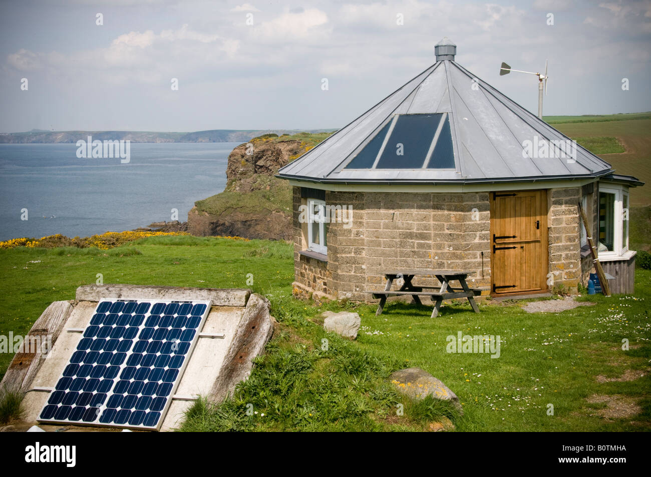 Solar panels converting sunshine into electricity for a small round