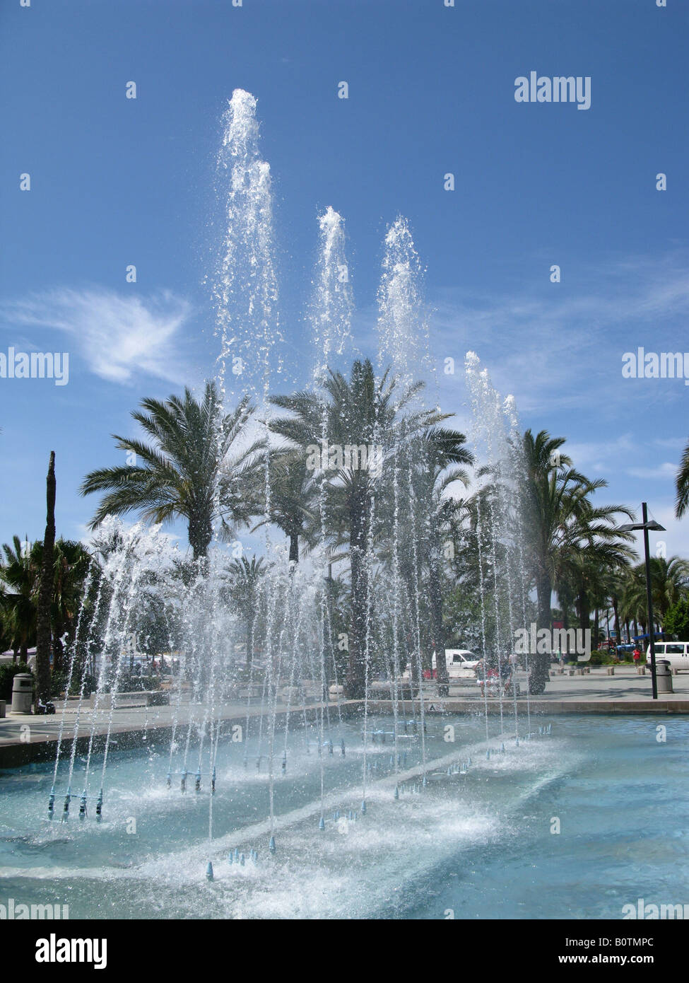Water fountain against a blue sky Stock Photo - Alamy