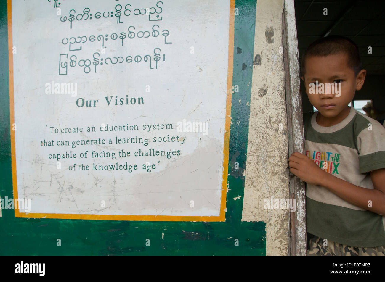 Young boy in a school at a rural area, Myanmar. Burma Stock Photo