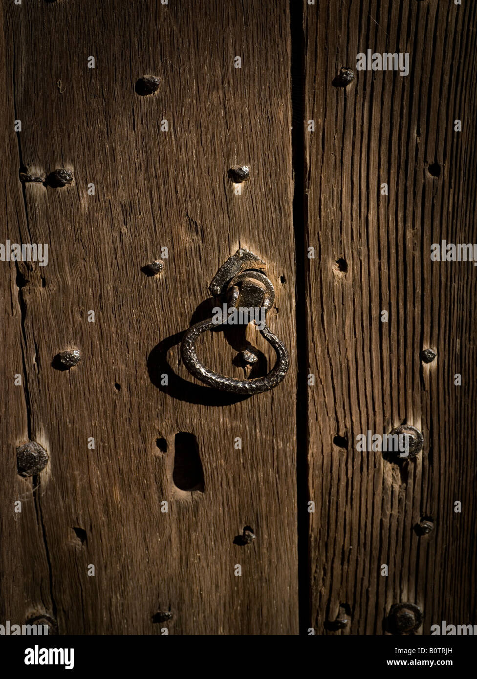 Studded wooden door hi-res stock photography and images - Alamy
