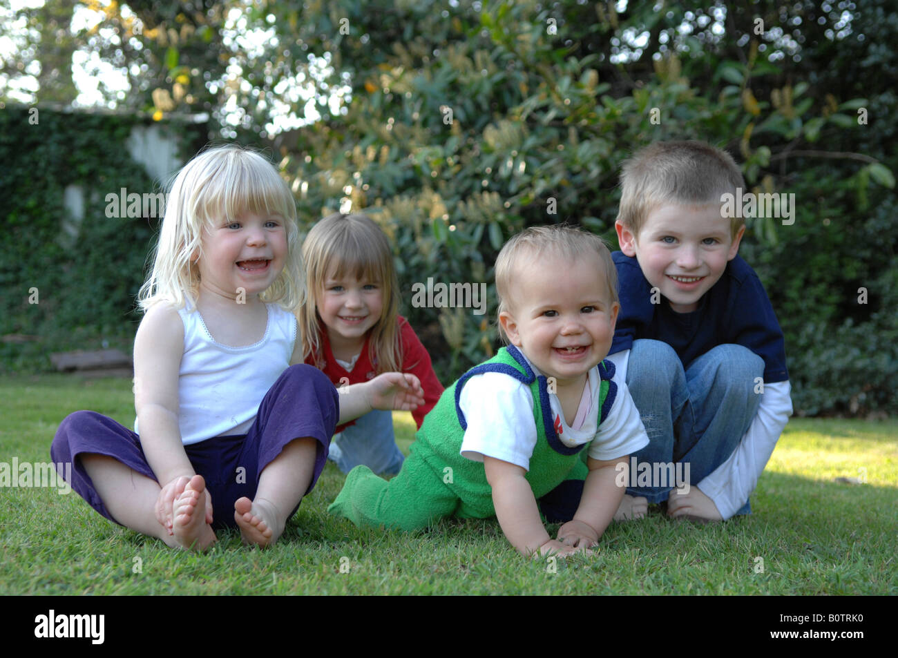 Happy children in garden Stock Photo