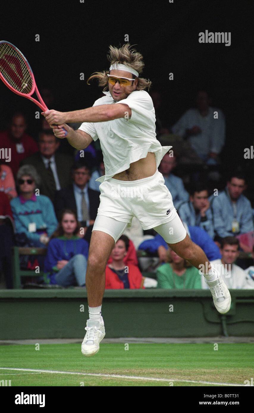 Wimbledon Tennis Tournament 1991 Andre Agassi wearing Oakley sun glasses.  Picture by David Bagnall. Wimbledon tennis action Andre Agassi Stock Photo  - Alamy