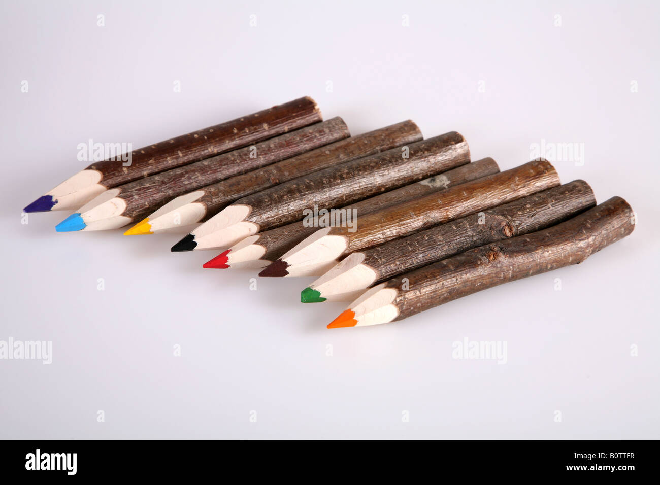 Eight wooden Coloured Pencils Stock Photo