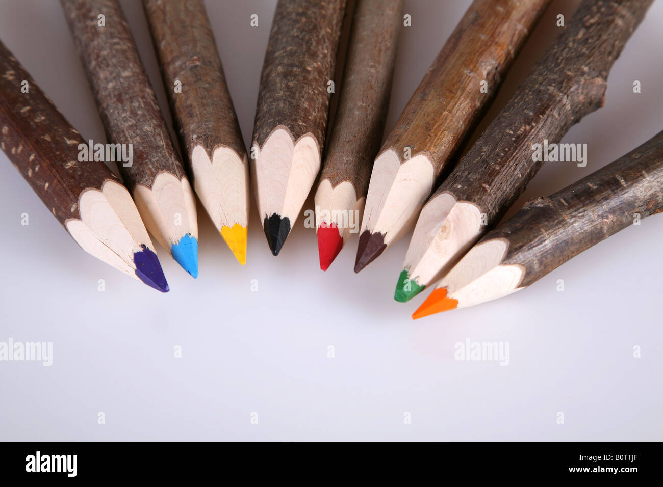 Eight wooden Coloured Pencils Stock Photo