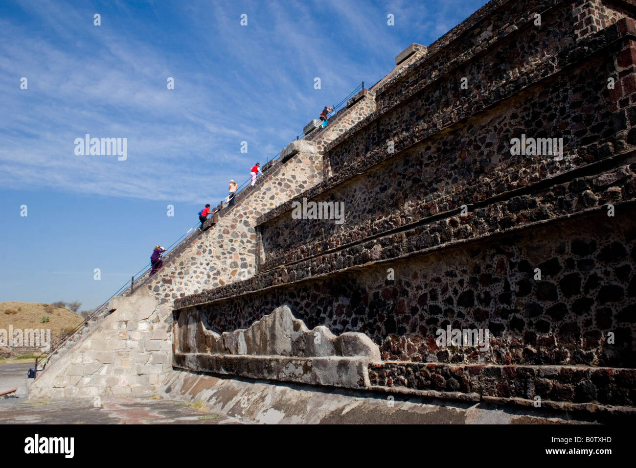 Tourists climb the Pyramid of the Moon at Teotihuacan, the largest pre-Columbian city in Mexico Stock Photo