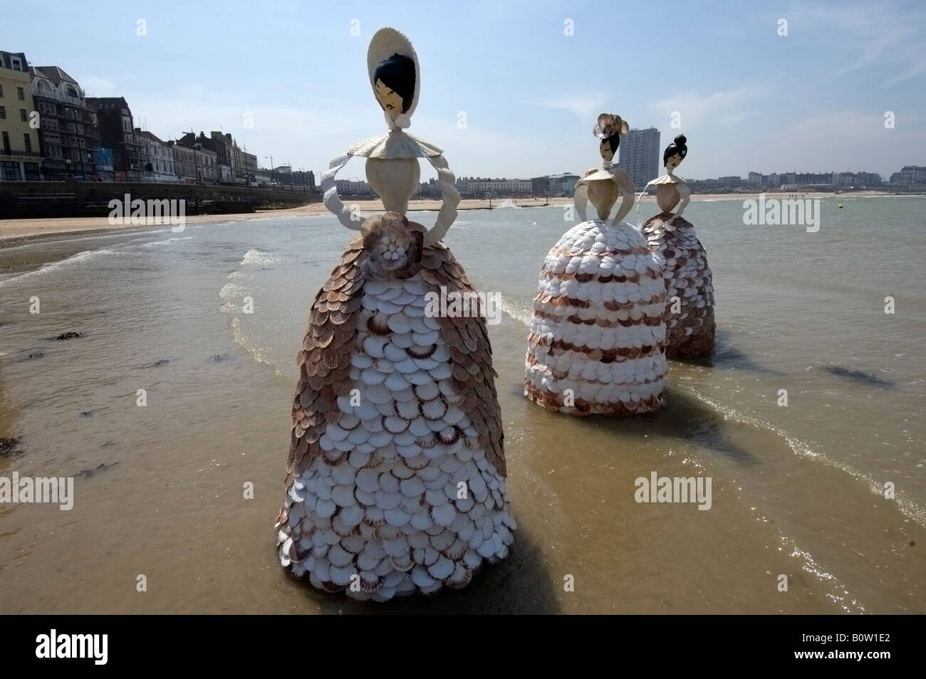 A group of 7ft high shell ladies on the sand of Margate Beach at 'low tide' Stock Photo
