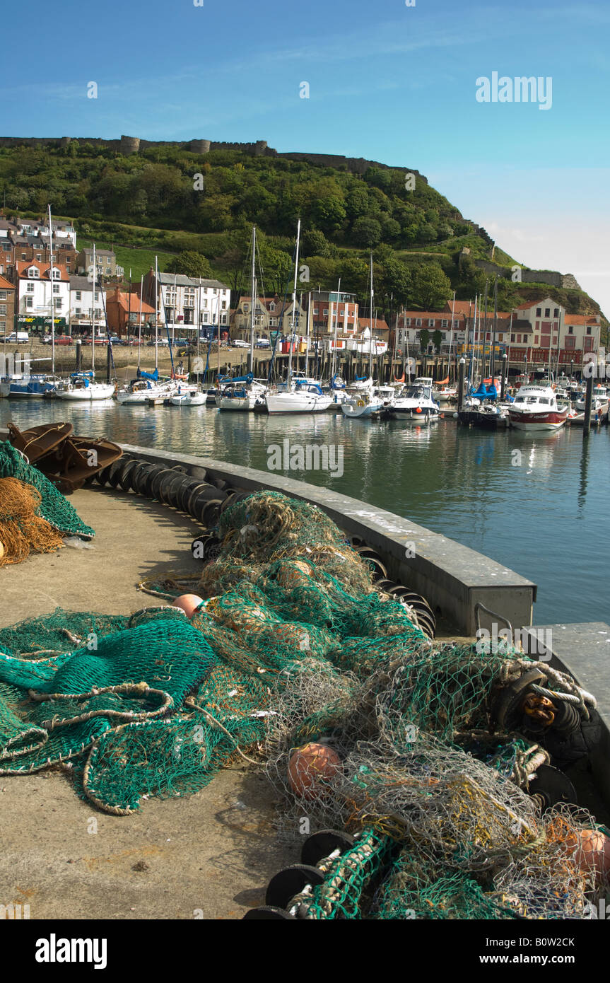 View of old town with fishing nets on harbour wall, Scarborough North Yorkshire, UK Stock Photo