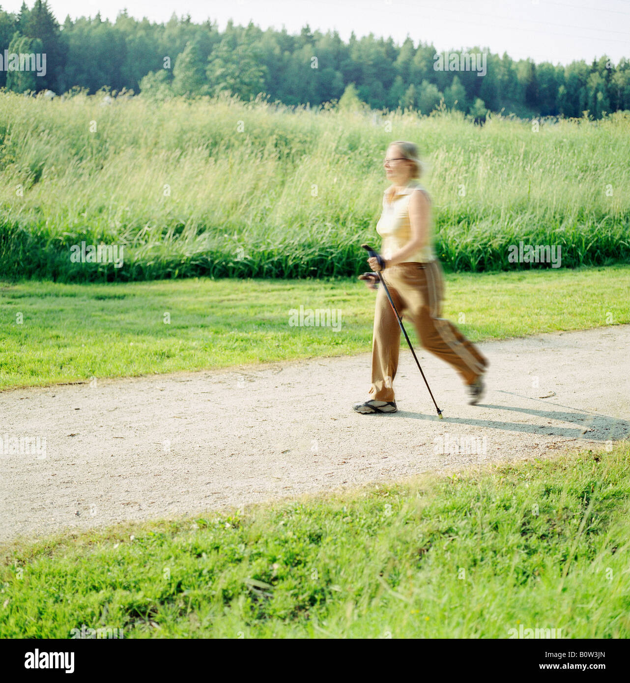 Mature woman summer walking hi-res stock photography and images - Alamy