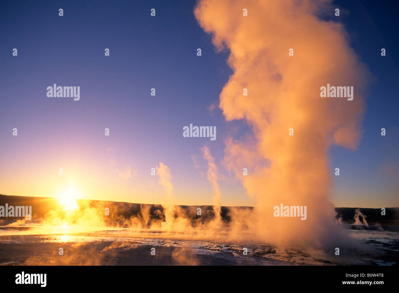 Fountain Geyser at sunset Fountain Paint Pot area Yellowstone National Park Wyoming Stock Photo