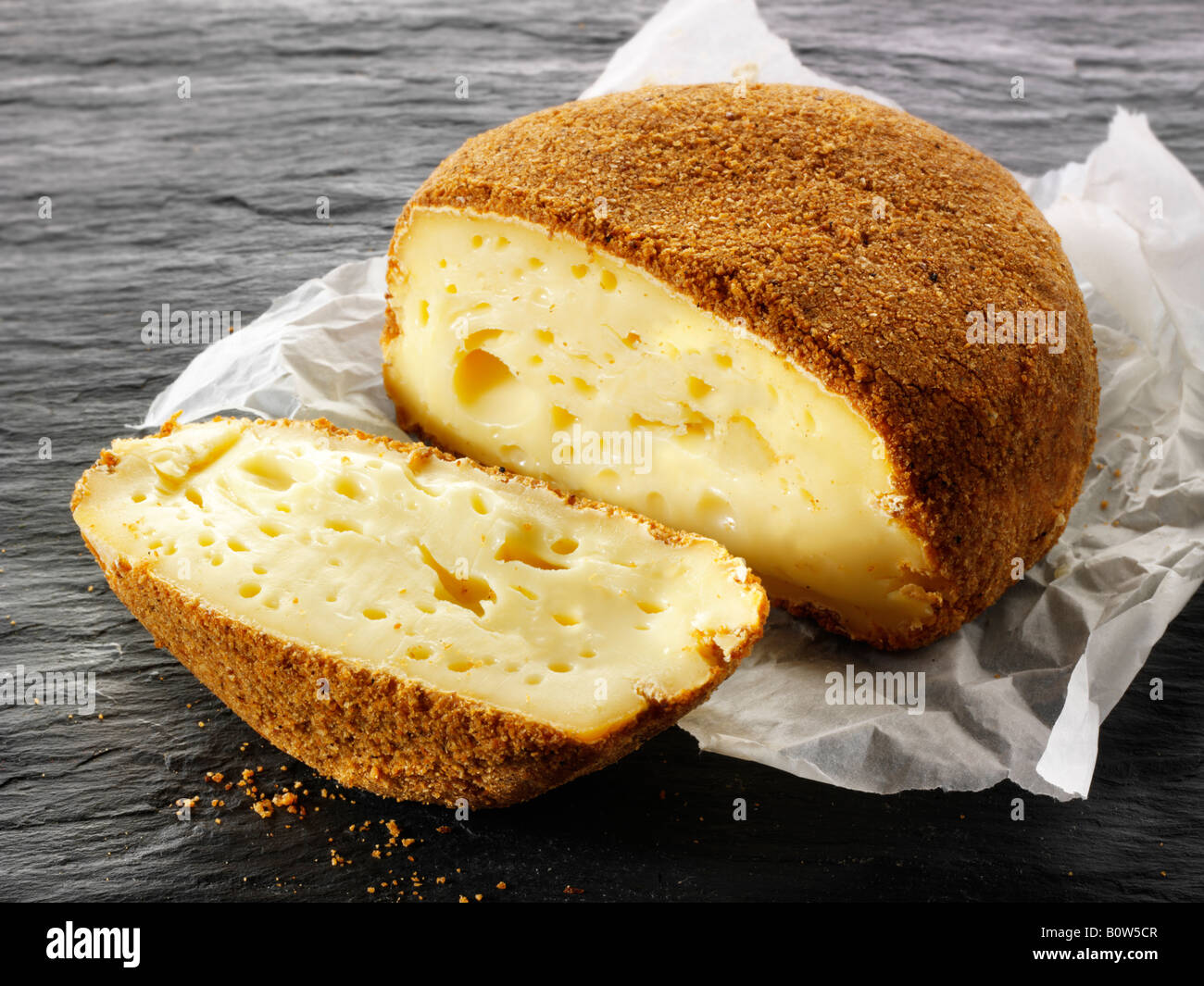 La Pucelle Regional French cows milk cheese from Normandy with apple liqueur from Fromagerie Maitre Pennec Stock Photo